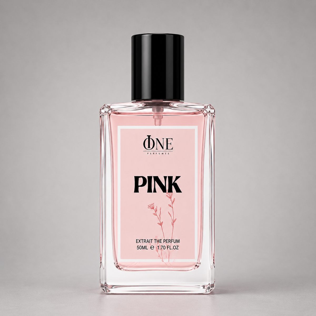 A rectangular glass bottle of One Perfume Pink Extrait Perfume with a black cap and a pink label, set against a neutral gray background.