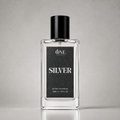 A rectangular glass perfume bottle with a black cap and a black label reading 'ONE PERFUME SILVER', photographed against a neutral light gray background.