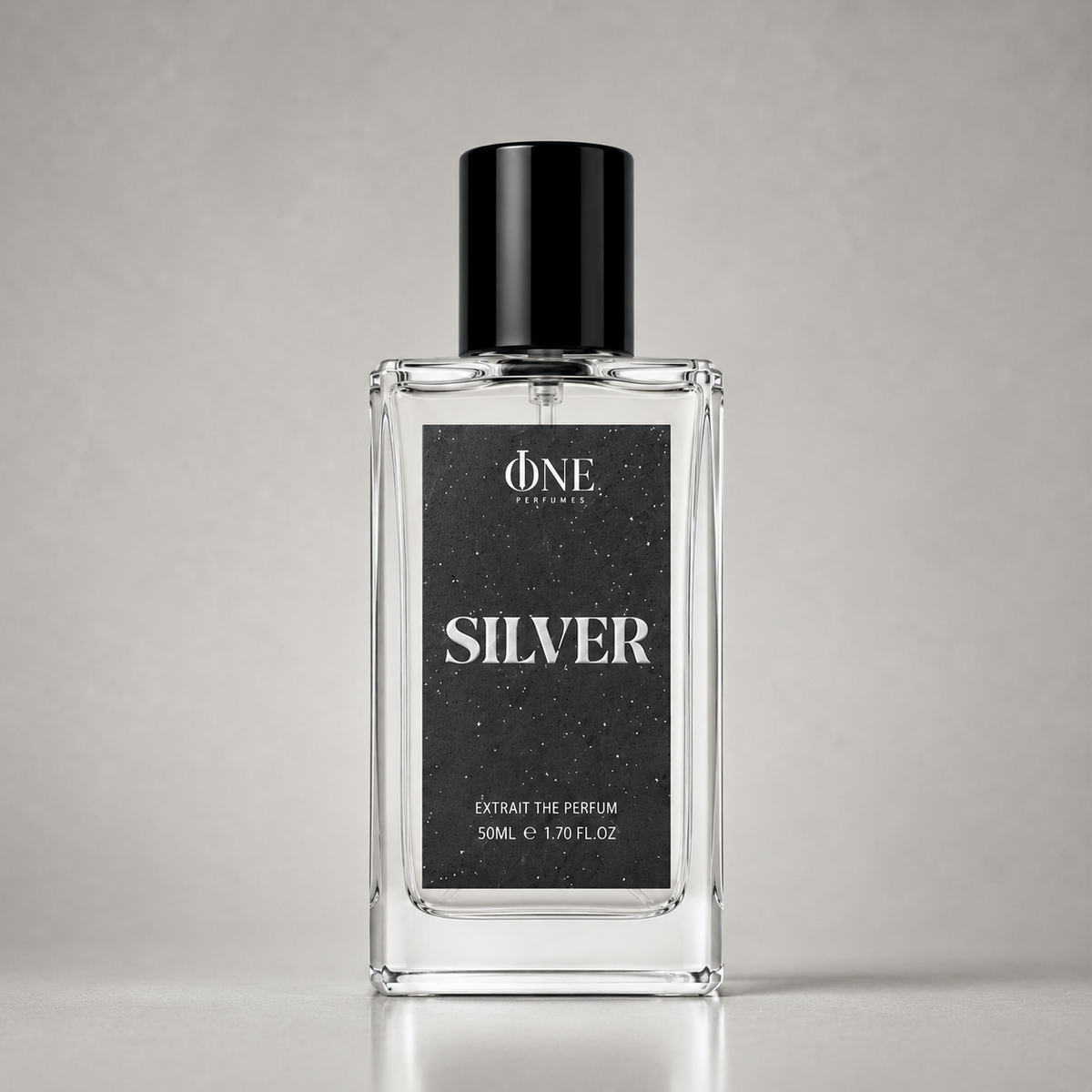 A rectangular glass perfume bottle with a black cap and a black label reading 'ONE PERFUME SILVER', photographed against a neutral light gray background.