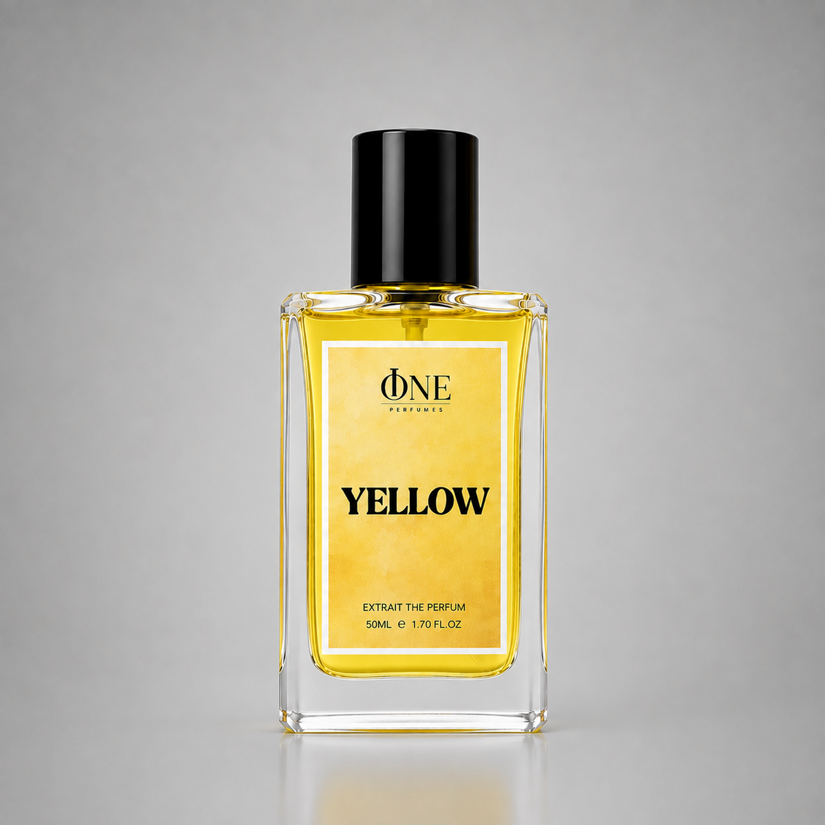 A rectangular glass perfume bottle filled with bright yellow liquid, featuring a black cap and a yellow label with black text that reads 'ONE PERFUMES' and 'YELLOW'.